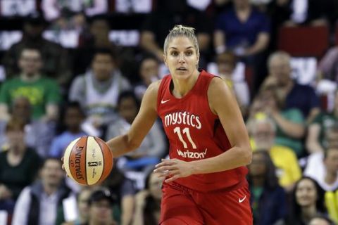 Washington Mystics' Elena Delle Donne heads up court against the Seattle Storm in the first half of Game 1 of the WNBA basketball finals Friday, Sept. 7, 2018, in Seattle. (AP Photo/Elaine Thompson)