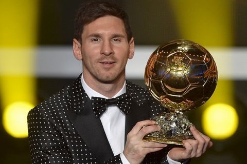 FIFA Ballon d'Or award winner Barcelona's Argentinian forward Lionel Messi poses with his trophy during the FIFA Ballon d'Or awards ceremony at the Kongresshaus in Zurich on January 7, 2013.     AFP PHOTO / FABRICE COFFRINI        (Photo credit should read FABRICE COFFRINI/AFP/Getty Images)