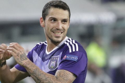 Anderlecht's Nicolae Stanciu celebrates after scoring during the Europa League Group C soccer match between Anderlecht and Mainz at the Constant Vanden Stock stadium in Brussels, on Thursday, Nov. 3, 2016. (AP Photo/Oliver Matthys)