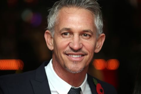 Gary Lineker poses for photographers upon arrival to the world premiere of the film The Hunger Games Mockingjay Part 1 in London, Monday, Nov. 10, 2014. (Photo by Joel Ryan/Invision/AP)