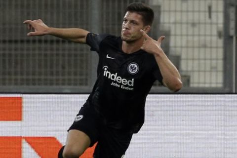 Eintracht Frankfurt's Luka Jovic reacts after scoring his side second goal during the Europa League, group H soccer match between Marseille and Eintracht Frankfurt played behind closed doors at the Velodrome stadium in Marseille, southern France, Thursday Sept. 20, 2018. (AP Photo/Claude Paris)