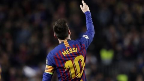 Barcelona's Lionel Messi celebrates after scoring his side's third goal during the Champions League semifinal, first leg, soccer match between FC Barcelona and Liverpool at the Camp Nou stadium in Barcelona, Spain, Wednesday, May 1, 2019. (AP Photo/Emilio Morenatti)