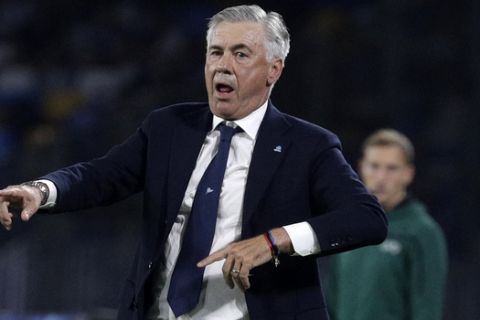Napoli's head coach Carlo Ancelotti reacts during the Champions League Group E soccer match between Napoli and Liverpool, at the San Paolo stadium in Naples, Italy, Tuesday, Sept. 17, 2019. (AP Photo/Gregorio Borgia)