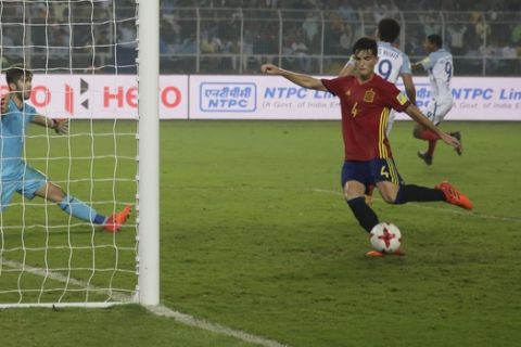 Spain's Hugo Guillamon kicks the ball into the net in frustration after England's Philip Foden scored a goal during the FIFA U-17 World Cup final match between England and Spain in Kolkata, India, Saturday, Oct. 28, 2017. (AP Photo/Anupam Nath)