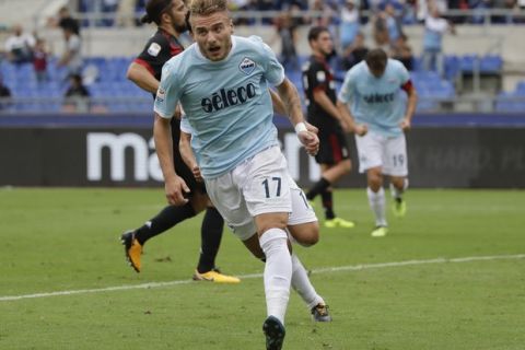 Lazio's Ciro Immobile celebrates after scoring during a Serie A soccer match between Lazio and AC Milan, at the Rome Olympic stadium, Sunday, Sept. 10, 2017. (AP Photo/Alessandra Tarantino)