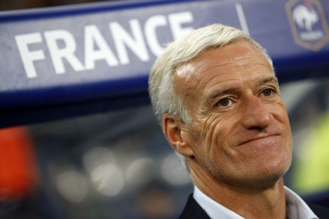 France's head coach Didier Deschamps reacts before the World Cup Group A qualifying soccer match between France and Belarus at the Stade de France stadium in Saint-Denis, outside Paris, Tuesday, Oct.10, 2017. (AP Photo/Christophe Ena)
