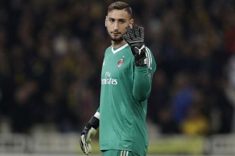 AC Milan goalkeeper Gianluigi Donnarumma gives instructions during the Europa League group D soccer match between AEK Athens and AC Milan at the Olympic stadium, in Athens, Thursday, Nov. 2, 2017. (AP Photo/Thanassis Stavrakis)