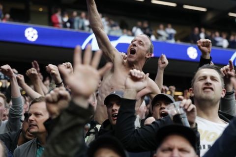 Tottenham fans cheer prior to the Champions League semifinal first leg soccer match between Tottenham Hotspur and Ajax at the Tottenham Hotspur stadium in London, Tuesday, April 30, 2019. (AP Photo/Frank Augstein)