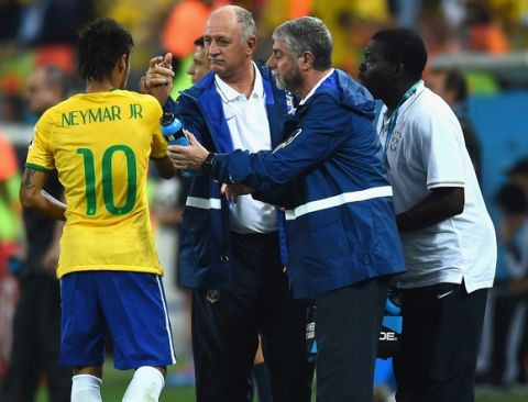 SAO PAULO, BRAZIL - JUNE 12: Neymar of Brazil celebrates scoring in the first half with head coach Luiz Felipe Scolari of Brazil during the 2014 FIFA World Cup Brazil Group A match between Brazil and Croatia at Arena de Sao Paulo on June 12, 2014 in Sao Paulo, Brazil.  (Photo by Christopher Lee/Getty Images)