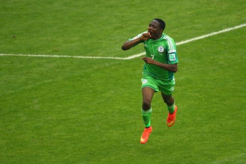 PORTO ALEGRE, BRAZIL - JUNE 25:  Ahmed Musa of Nigeria celebrates scoring his team's second goal and his second of the game during the 2014 FIFA World Cup Brazil Group F match between Nigeria and Argentina at Estadio Beira-Rio on June 25, 2014 in Porto Alegre, Brazil.  (Photo by Quinn Rooney/Getty Images)
