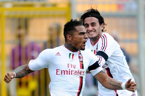 AC Milan's midfielder Kevin Boateng (L) celebrates with teammate Alberto Aquilani after scoring against Lecce on October 23, 2011 during a Serie A football match at the Via del Mare Stadium in Lecce. AFP PHOTO / Filippo MONTEFORTE (Photo credit should read FILIPPO MONTEFORTE/AFP/Getty Images)