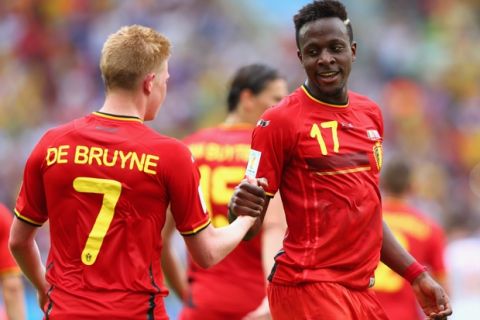 RIO DE JANEIRO, BRAZIL - JUNE 22:  Divock Origi of Belgium (right) celebrates scoring his team's first goal with Kevin De Bruyne during the 2014 FIFA World Cup Brazil Group H match between Belgium and Russia at Maracana on June 22, 2014 in Rio de Janeiro, Brazil.  (Photo by Jamie Squire/Getty Images)