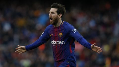 FC Barcelona's Lionel Messi reacts after scoring during the Spanish La Liga soccer match between FC Barcelona and Atletico Madrid at the Camp Nou stadium in Barcelona, Spain, Sunday, March 4, 2018. (AP Photo/Manu Fernandez)