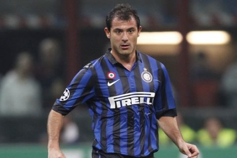 Inter Milan Serbian midfielder Dejan Stankovic controls the ball during a second leg Champions League round of 16 soccer match, at the San Siro stadium, in Milan, Italy, Tuesday, March, 13, 2012. (AP Photo/Luca Bruno)