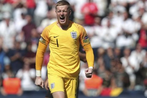 England goalkeeper Jordan Pickford reacts at the end the UEFA Nations League third place soccer match between Switzerland and England at the D. Afonso Henriques stadium in Guimaraes, Portugal, Sunday, June 9, 2019. (AP Photo/Luis Vieira)