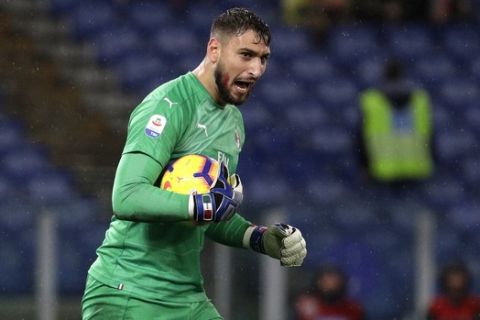 FILE - In this Sunday, Nov. 25, 2018 file photo, AC Milan goalkeeper Gianluigi Donnarumma reacts during a Serie A soccer match between Lazio and AC Milan, at the Rome Olympic stadium. Donnarumma has been a mainstay between the posts for Milan since making his debut in 2015 and has made more than 150 appearances for the club as well as also playing for the Italy national team. It is sometimes easy to forget how young he is. He turned 20 on Monday. "Donnarumma is incredible, I wished him happy birthday earlier," said Adriano Galliani, who was Milan CEO when the young goalkeeper broke through. "To think he has played more than 150 matches for Milan at the age of 20 is extraordinary. (AP Photo/Gregorio Borgia, File)