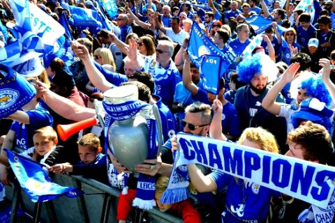 Leicester City fans gather at Victoria Park before the victory parade to celebrate winning the English Premier league title in Leicester, England, Monday, May 16, 2016. (AP Photo/Rui Vieira)