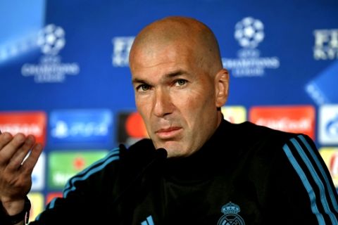 Real Madrid coach Zinedine Zidane gestures during a press conference at the Olympic stadium in Kiev, Ukraine, Friday, May 25, 2018 ahead of the Champions League final soccer match between Real Madrid and Liverpool on Saturday May 26. (UEFA Pool via AP)