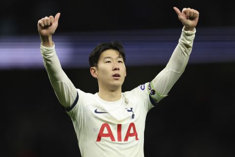 Tottenham's Son Heung-min celebrates at full time of the English Premier League soccer match between Tottenham Hotspur and AFC Bournemouth at the Tottenham Hotspur Stadium in London, Sunday, Dec. 31, 2023. Tottenham won 3-1. (AP Photo/Ian Walton)