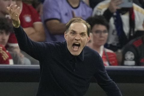 Bayern's head coach Thomas Tuchel shouts out as gives instructions from the side line during the Champions League semifinal first leg soccer match between Bayern Munich and Real Madrid at the Allianz Arena in Munich, Germany, Tuesday, April 30, 2024. (AP Photo/Matthias Schrader)