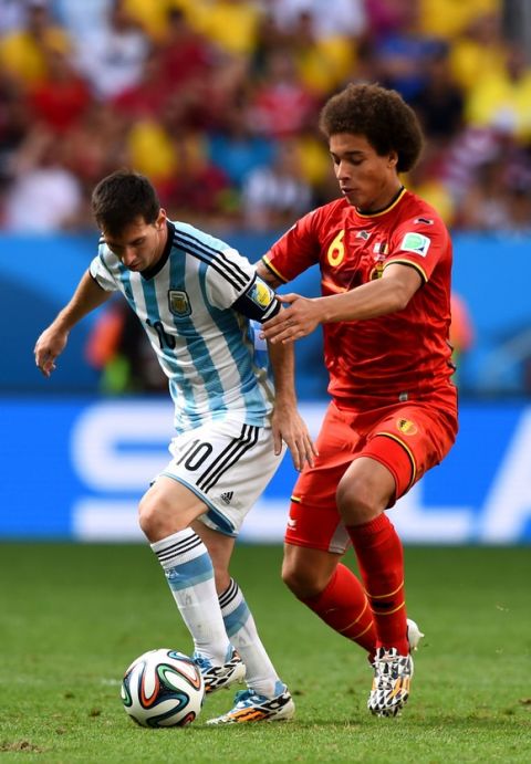 BRASILIA, DF - JULY 05: Lionel Messi of Argentina controls the ball against Axel Witsel of Belgium during the 2014 FIFA World Cup Brazil Quarter Final match between Argentina and Belgium at Estadio Nacional on July 5, 2014 in Brasilia, Brazil.  (Photo by Matthias Hangst/Getty Images)
