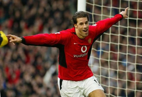 Manchester United's Ruud Van Nistelrooy celebrates after scoring against Manchester City during their Premiership soccer match at Old Trafford, Manchester, England Saturday Dec. 13, 2003.  (AP  Photo/ Phil Noble, PA) ** UNITED KINGDOM OUT NO SALES MAGAZINES OUT INTERNET OUT ONLINE OUT **