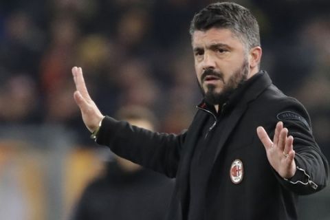 AC Milan coach Gennaro Gattuso gestures during a Serie A soccer match between Roma and AC Milan, at the Rome Olympic stadium, Sunday, Feb. 25, 2018. (AP Photo/Alessandra Tarantino)
