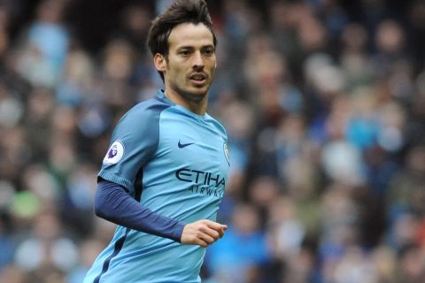 Manchester Citys David Silva during the English Premier League soccer match between Manchester City and Chelsea at the Etihad Stadium in Manchester, England, Saturday, Dec. 3, 2016. (AP Photo/Rui Vieira)