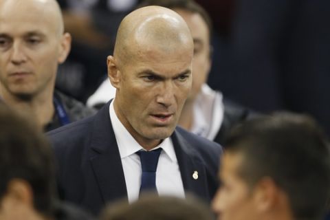 Real Madrid's head coach Zinedine Zidane stands prior the Champions League final soccer match between Juventus and Real Madrid at the Millennium Stadium in Cardiff, Wales, Saturday June 3, 2017. (AP Photo/Kirsty Wigglesworth)