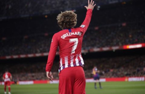 Atletico forward Antoine Griezmann reacts after putting a shot on goal straight in the arms of Barcelona goalkeeper Marc-Andre ter Stegen during a Spanish La Liga soccer match between FC Barcelona and Atletico Madrid at the Camp Nou stadium in Barcelona, Spain, Saturday April 6, 2019. (AP Photo/Manu Fernandez)