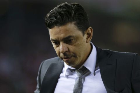 Argentina's River Plate's coach Marcelo Gallardo leaves the field at half time during the Copa Sudamericana final soccer match against Colombia's Atletico Nacional in Buenos Aires, Argentina, Wednesday, Dec. 10, 2014. (AP Photo/Natacha Pisarenko)