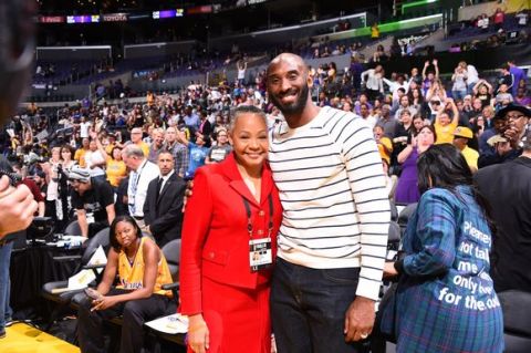 LOS ANGELES, CA - OCTOBER 16: NBA Legend Kobe Bryant and WNBA President Lisa Borders are seen during the game between the Minnesota Lynx and the Los Angeles Sparks during Game Four of the 2016 WNBA Finals on October 16, 2016 at Staples Center in Los Angeles, California. NOTE TO USER: User expressly acknowledges and agrees that, by downloading and/or using this Photograph, user is consenting to the terms and conditions of the Getty Images License Agreement. Mandatory Copyright Notice: Copyright 2016 NBAE (Photo by Andrew D. Bernstein/NBAE via Getty Images)