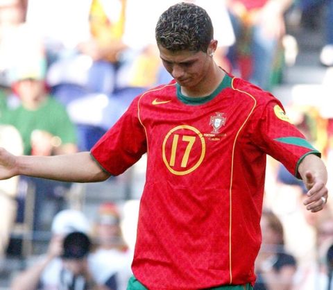 Portugal's Cristiano Ronaldo reacts during the Euro 2004 Group A soccer match between Portugal and Greece, at the Dragao stadium in Porto, Portugal, Saturday, June 12, 2004. The other teams in Group A are Russia and Spain. Greece won 2-1. (AP Photo/Luca Bruno)