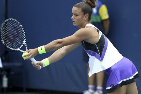 Maria Sakkari, of Greece, prepares to serve to Peng Shuai, of China, during the second round of the US Open tennis championships Wednesday, Aug. 28, 2019, in New York. (AP Photo/Kevin Hagen)