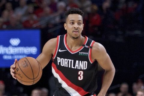 Portland Trail Blazers guard CJ McCollum during the second half of an NBA basketball game against the Washington Wizards in Portland, Ore., Monday, Oct. 22, 2018. (AP Photo/Craig Mitchelldyer)