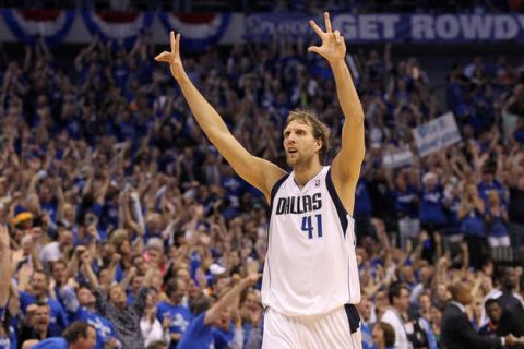 DALLAS, TX - MAY 25:  Dirk Nowitzki #41 of the Dallas Mavericks reacts after making a three-pointer in the fourth quarter while taking on the Oklahoma City Thunder in Game Five of the Western Conference Finals during the 2011 NBA Playoffs at American Airlines Center on May 25, 2011 in Dallas, Texas. NOTE TO USER: User expressly acknowledges and agrees that, by downloading and or using this photograph, User is consenting to the terms and conditions of the Getty Images License Agreement.  (Photo by Ronald Martinez/Getty Images)