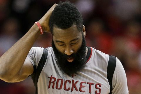 Houston Rockets guard James Harden walks the court late in the fourth quarter in Game 6 of the team's NBA basketball second-round playoff series against the San Antonio Spurs, Thursday, May 11, 2017, in Houston. San Antonio won 114-75. (AP Photo/Eric Christian Smith)