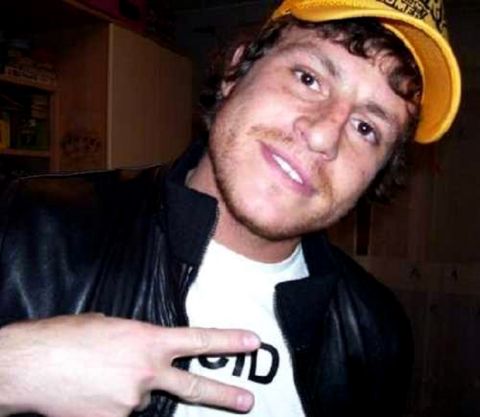 A recent photo of Gabriele Sandri, 26, a Lazio soccer fan from Rome, killed Sunday, Nov. 11, 2007, during a clash with Juventus team supporters at a highway rest stop. Authorities are reportedly investigating whether the victim might have been killed by a stray police warning shot.  He had reportedly been headed to Lazio's match in Milan against Inter Milan before becoming involved in a clash with Juventus supporters on their way to Reggio Calabria to attend the soccer major league game Reggina vs Juventus.  The Italian soccer federation announced that the Inter-Lazio game was postponed to a date to be determined. Sunday's other games were to start 10 minutes late, with players and referees wearing black armbands. (AP Photo/Alessandro Spani)