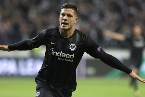 Frankfurt's Luka Jovic celebrates after scoring the opening goal during a Uefa Europa League, first leg semifinal soccer match between Eintracht Frankfurt and FC Chelsea in the Commerzbank Arena in Frankfurt, Germany, Thursday, May 2, 2019. (AP Photo/Michael Probst)