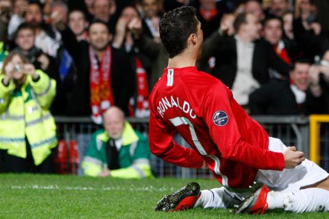 Manchester United's Cristiano Ronaldo celebrates after scoring against Inter Milan during their Champions League Second Round Second Leg soccer match at Old Trafford Stadium, Manchester, England, Wednesday, March 11, 2009. (AP Photo/Jon Super)