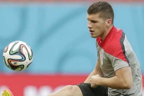 Ante Rebic of Croatia controls a ball during a training session at the Arena Pernambuco in Recife, Brazil, Sunday, June 22, 2014. Croatia will play Mexico in group A of the 2014 soccer World Cup. (AP Photo/Petr David Josek)