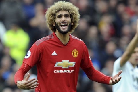 Manchester United's Marouane Fellaini gestures during the English Premier League soccer match between Manchester United and Wolverhampton Wanderers at Old Trafford stadium in Manchester, England, Saturday, Sept. 22, 2018. (AP Photo/Rui Vieira)