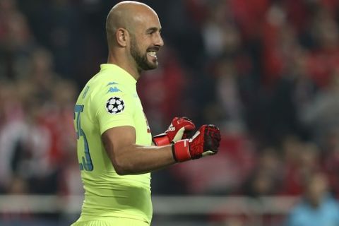 Napoli goalkeeper Pepe Reina celebrates after winning the Champions League group B soccer match between Benfica and Napoli at the Luz stadium in Lisbon, Portugal, Tuesday, Dec. 6, 2016. (AP Photo/Steven Governo)