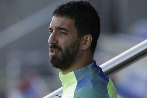 FC Barcelona's Arda Turan attends a training session at the Sports Center FC Barcelona Joan Gamper in Sant Joan Despi, Spain, Saturday, March 18, 2017. FC Barcelona will play against Valencia during a Spanish La Liga on Sunday. (AP Photo/Manu Fernandez)