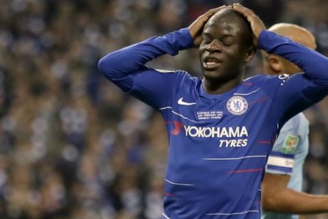 Chelsea's Ngolo Kante reacts after missing a chance to score during the English League Cup final soccer match between Chelsea and Manchester City at Wembley stadium in London, England, Sunday, Feb. 24, 2019. (AP Photo/Tim Ireland)