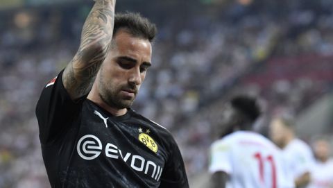 Dortmund's Paco Alcacer reacts during the German Bundesliga soccer match between FC Cologne and Borussia Dortmund in Cologne, Germany, Friday, Aug.23, 2019. (AP Photo/Martin Meissner)