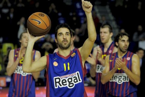Regal FC Barcelona's Juan Carlos Navarro celebrates at the end of the mach after scoring his 2716 point, making him the top scorer of the Euroleague, during the Euroleague basketball match at the Palau Blaugrana Barcelona on November 24, 2011. AFP PHOTO/JOSEP LAGO (Photo credit should read JOSEP LAGO/AFP/Getty Images)