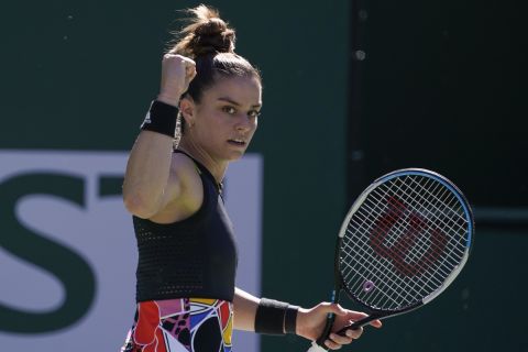 Maria Sakkari celebrates after winning a point during a match against Katerina Siniakova, of the Czech Republic, at the BNP Paribas Open tennis tournament Saturday, March 12, 2022, in Indian Wells, Calif. (AP Photo/Mark Terrill)