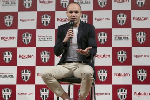 Spain's Andres Iniesta attends a press conference announcing his move to Japan's Vissel Kobe in Tokyo, Thursday, May 24, 2018. (AP Photo/Eugene Hoshiko)