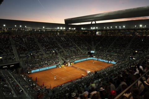 Rafael Nadal of Spain and Stefanos Tsitsipas of Greece play the Madrid Open tennis men's semi-final match at the Caja Magica (Magic Box) in Madrid, Spain, Saturday, May 11, 2019. (AP Photo/Bernat Armangue)